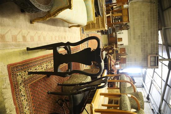 A pair of 1920s chinoiserie lacquer dining chairs